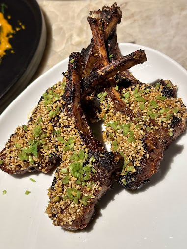 Saizon signature dishes  Pork Belly Al Pastor Bao, Charcoal Grilled Oysters, Grilled Lamb Chops